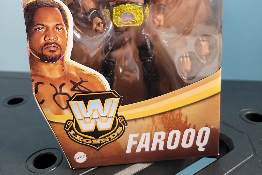 inspecting collectible figure