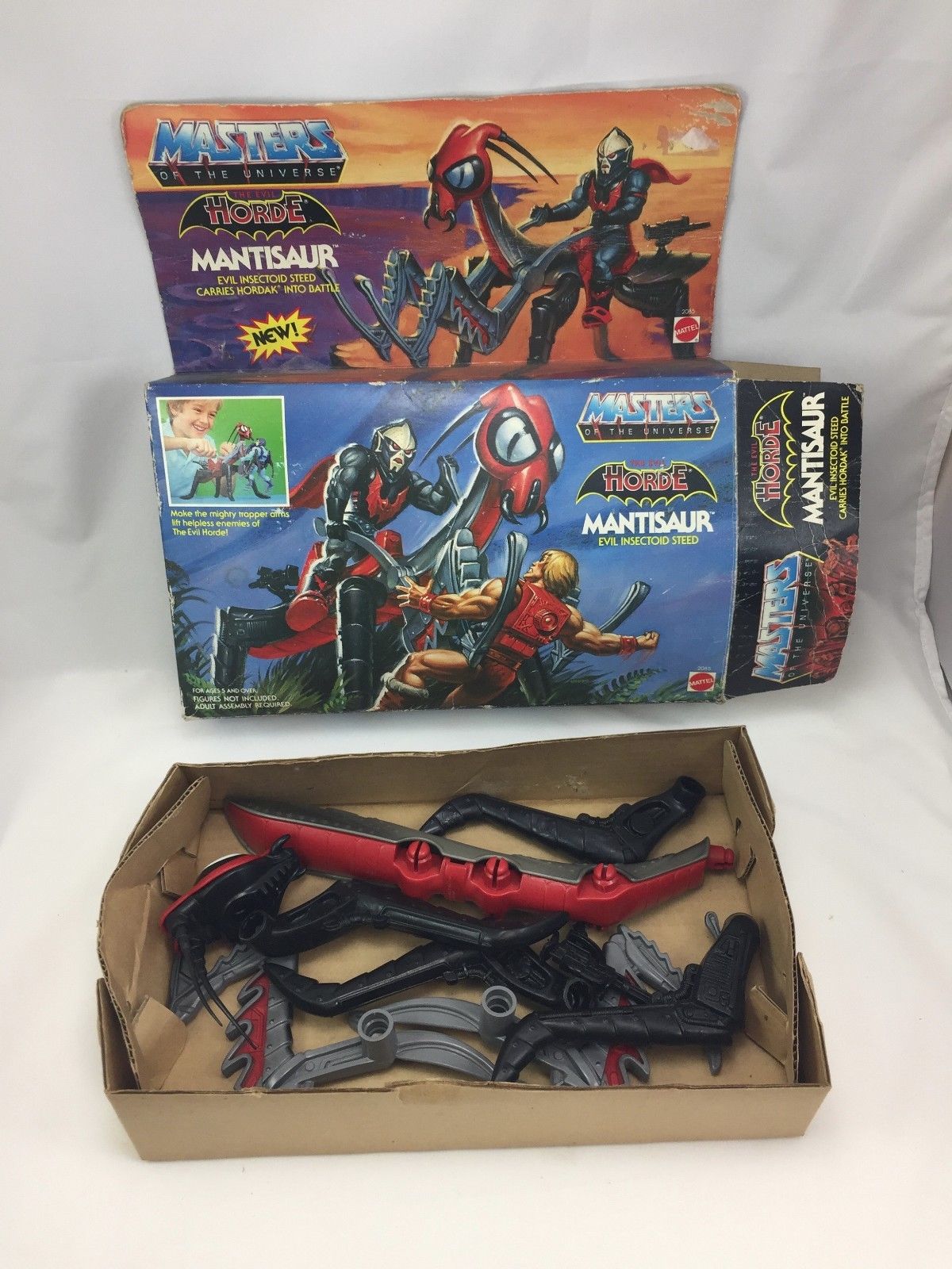 lifting collectible figure from box