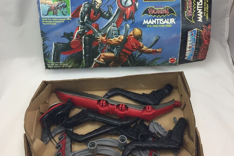 lifting collectible figure from box