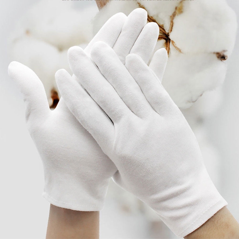 white cotton archival gloves