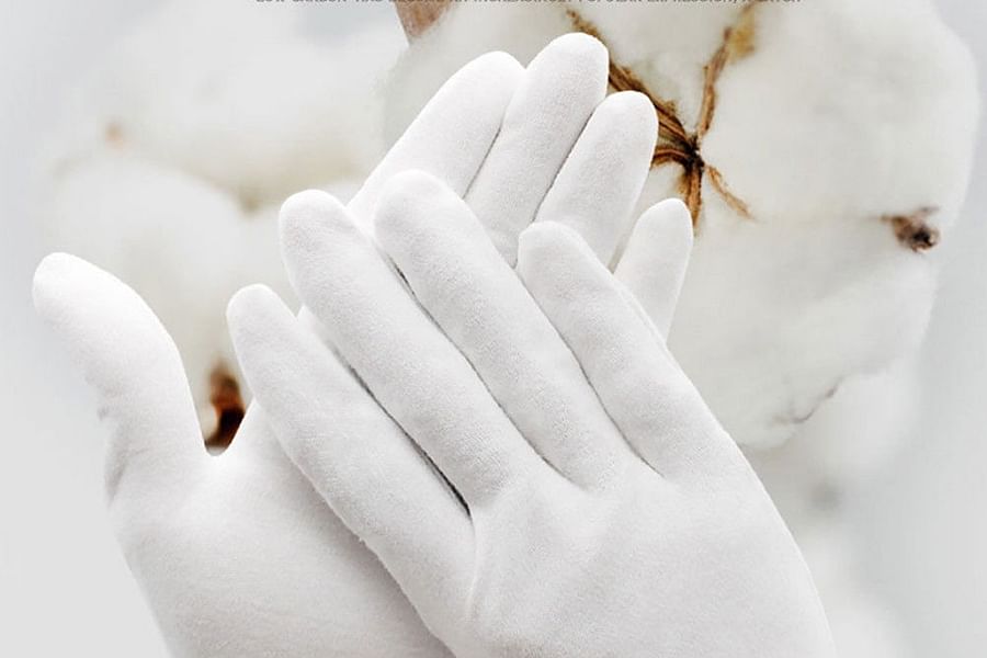 white cotton archival gloves