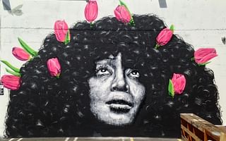 Are there any female street artists who use graffiti?